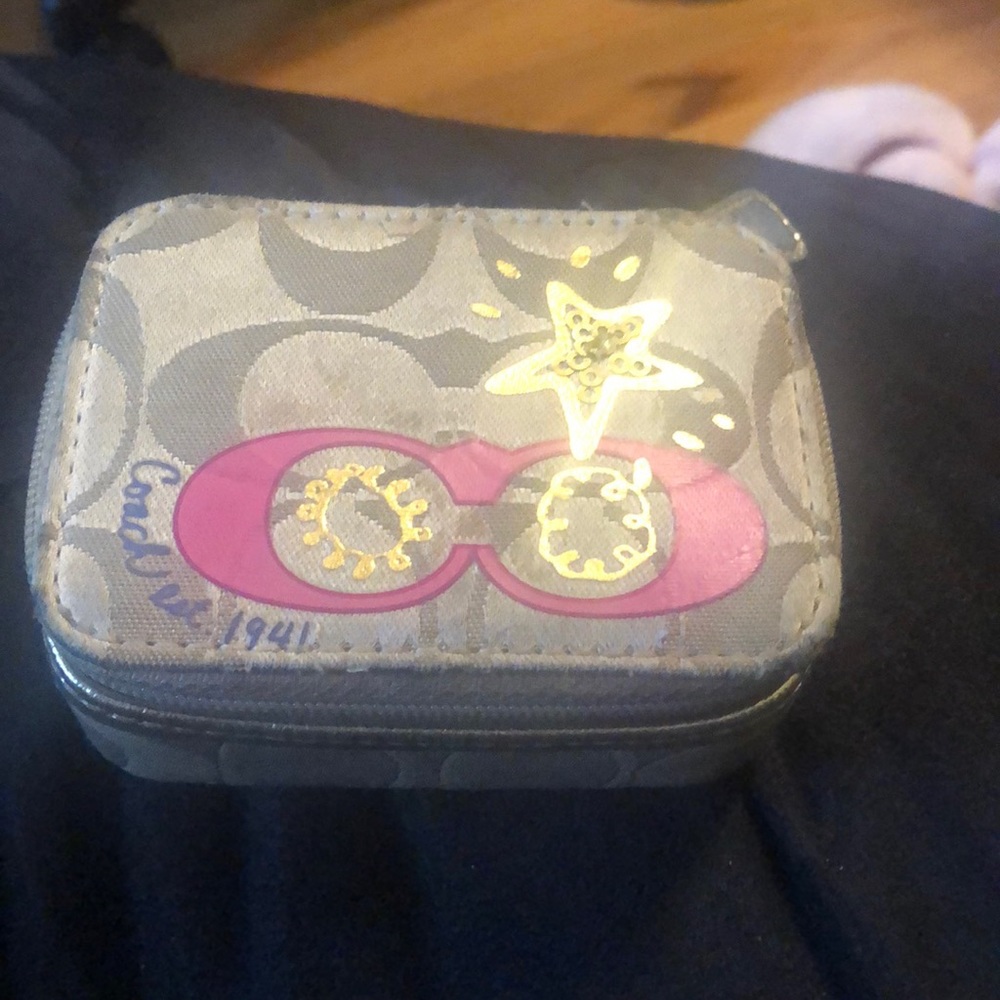 Coach pill case